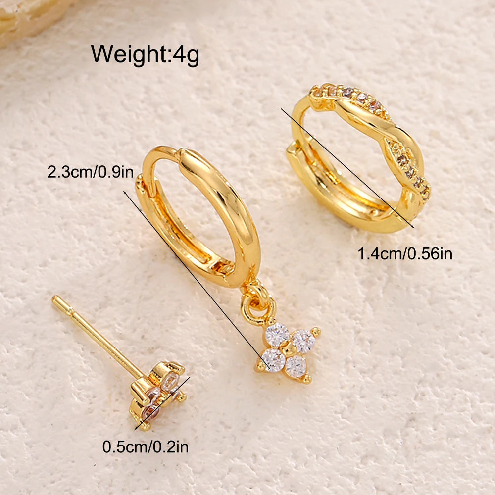 Conjunto de 3 brincos de argola com pingente de flor